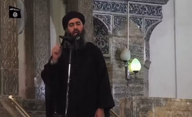 Thủ lĩnh IS Abu Bakr Al-Baghdad trong một lần xuất hiện hiếm hoi. Ảnh Reuters