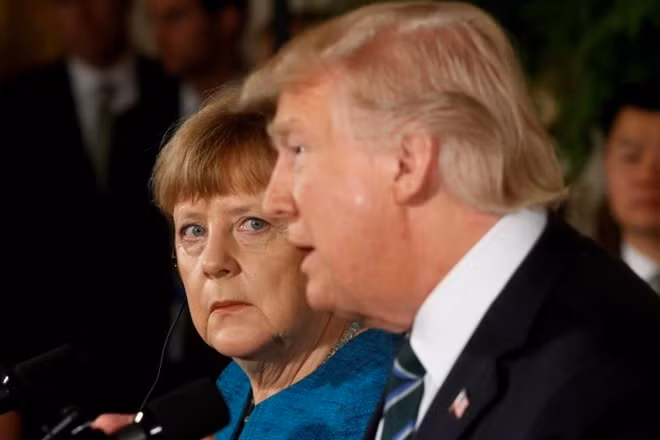 Tổng thống Mỹ Donald Trump và Thủ tướng Đức Angela Merkel. Ảnh Reuters