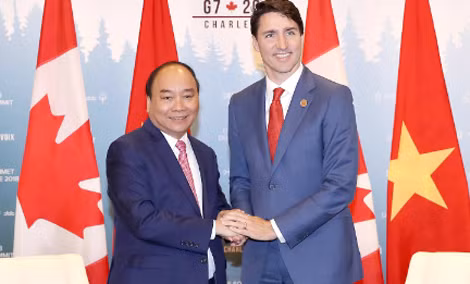 Thủ tướng Nguyễn Xuân Phúc và Thủ tướng Canada Justin Trudeau. Ảnh: VGP/Quang Hiếu Thủ tướng Nguyễn Xuân Phúc và Thủ tướng Canada Justin Trudeau. Ảnh: VGP/Quang Hiếu