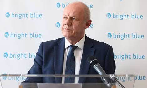 Ông Damian Green.