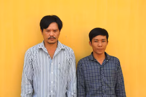 Nghi phạm Huỳnh Văn Thanh và Lê Ngọc Đến tại cơ quan điều tra.