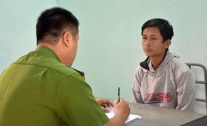 Nguyễn Đức Vinh tại cơ quan Công an. Ảnh: H.V