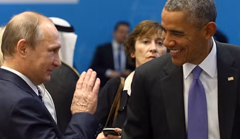 Tổng thống Nga Vladimir Putin (trái) và người đồng cấp Mỹ Barack Obama trong một lần gặp gỡ mới đây. Ảnh: Sputnik.