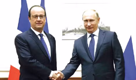 Tổng thống Pháp Francois Hollande (trái) và người đồng cấp Nga Vladimir Putin tại cuộc gặp hôm 6/12. Ảnh: Reuters.