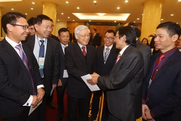 Tổng Bí thư Nguyễn Phú Trọng với các đại biểu. Ảnh: TTXVN.