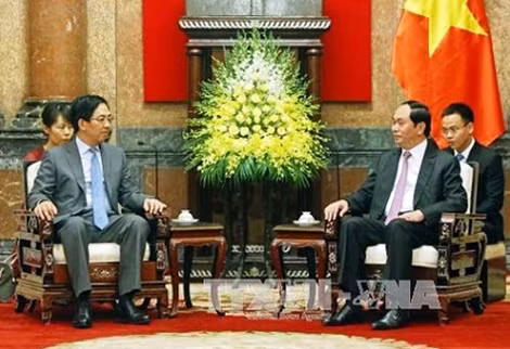 Chủ tịch nước Trần Đại Quang tiếp Đại sứ Trung Quốc Hồng Tiểu Dũng. Ảnh: TTXVN.