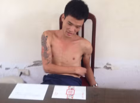 Vũ Văn Tuyền tại cơ quan công an.