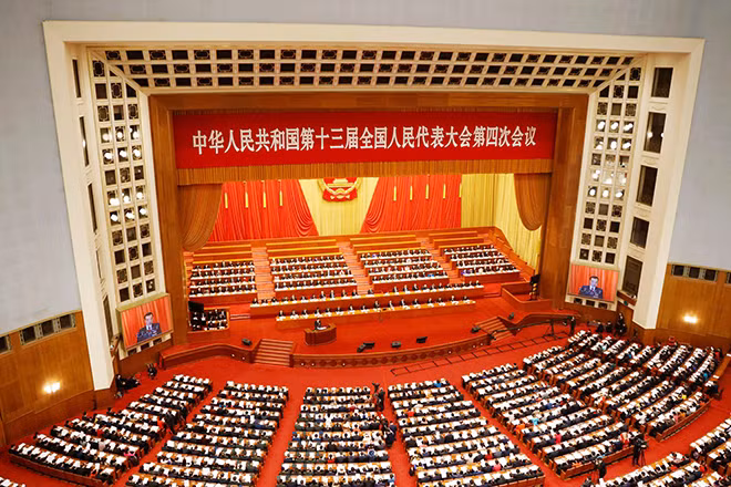 Toàn cảnh một phiên họp Quốc hội Trung Quốc sáng 5-3 tại Thủ đô Bắc Kinh. Ảnh: Reuters Toàn cảnh một phiên họp Quốc hội Trung Quốc sáng 5-3 tại Thủ đô Bắc Kinh. Ảnh: Reuters