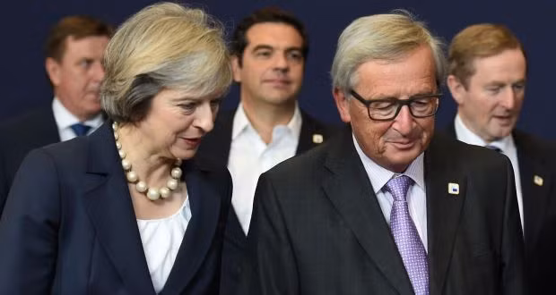 Thủ tướng Anh Theresa May và Chủ tịch Ủy ban châu Âu (EC) Jean-Claude Juncker. Ảnh: CNN