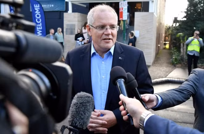 Thủ tướng Australia phát biểu trước báo giới. Ảnh: Reuters