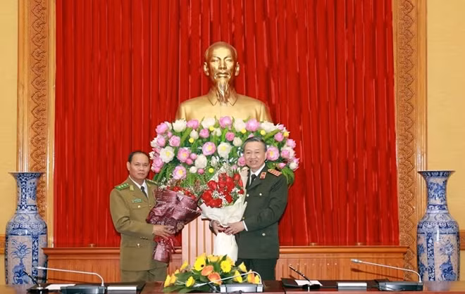 Bộ trưởng Tô Lâm; Bộ trưởng Vilay Lakhamphong.