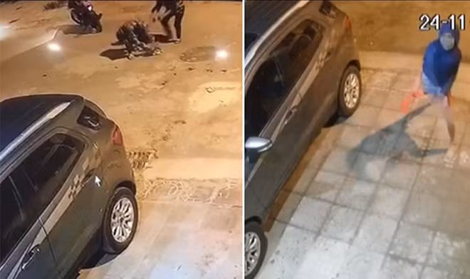 Các đối tượng thực hiện hành vi ném chất bẩn vào nhà phóng viên (ảnh cắt từ video). Các đối tượng thực hiện hành vi ném chất bẩn vào nhà phóng viên (ảnh cắt từ video).