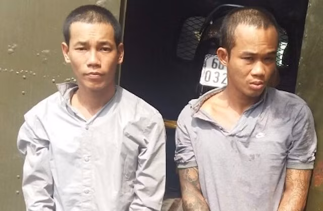 Đăng và Nhàn khi bị bắt giữ.