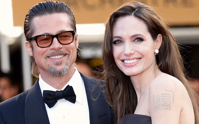 Theo tờ OK!, vụ chia tay của hai diễn viên hàng đầu Hollywood có thể đáng giá đến 400 triệu USD. Cặp đôi có 6 người con chung và đã ở bên nhau 12 năm, sau khi nảy sinh tình cảm trên phim trường Mr. & Mrs. Smith. Ảnh: parade.com.