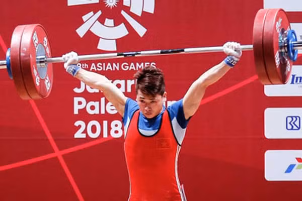 Trịnh Văn Vinh đoạt huy chương bạc cử tạ hạng 62 kg. Ảnh: Thethao24/7. Trịnh Văn Vinh đoạt huy chương bạc cử tạ hạng 62 kg. Ảnh: Thethao24/7.