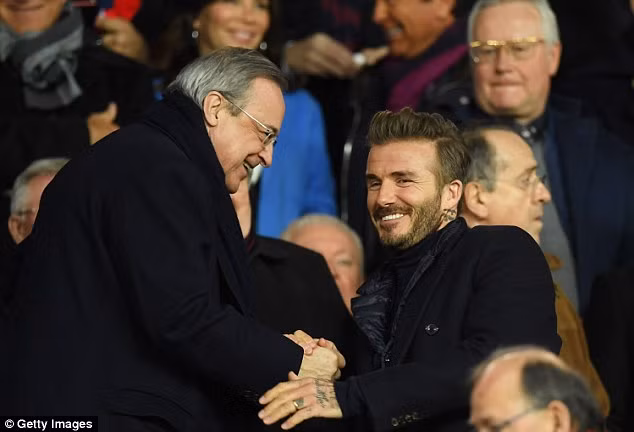 Beckham và Chủ tịch Real Florentino Perez. Ảnh: Getty Image.