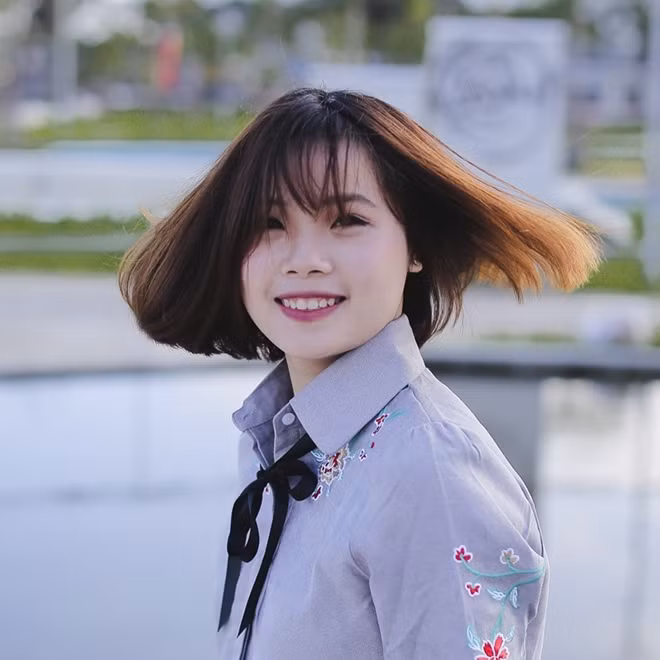 Bên trong nụ cười tỏa nắng là một nghị lực phi thường.