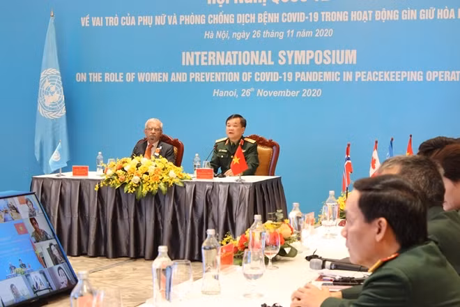 Thượng tướng Hoàng Xuân Chiến và Điều phối viên thường trú của Liên hợp quốc tại Việt Nam kiêm Đại diện thường trú của UNDP tại Việt Nam Kamal Malhotra.