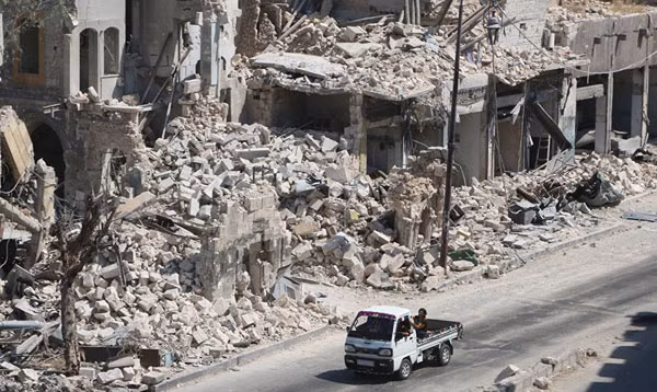 Aleppo hoang tàn sau các vụ không kích hôm 17-9. Ảnh: Sputnik.