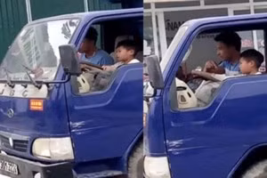 Hình ảnh cháu bé 10 tuổi lái xe tải trên phố (ảnh cắt từ clip)