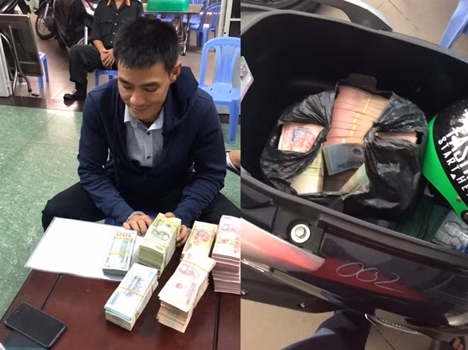 Bị can Đinh Trần Hải Nam với số tiền thu giữ trong đường dây tổ chức đánh bạc và đánh bạc.