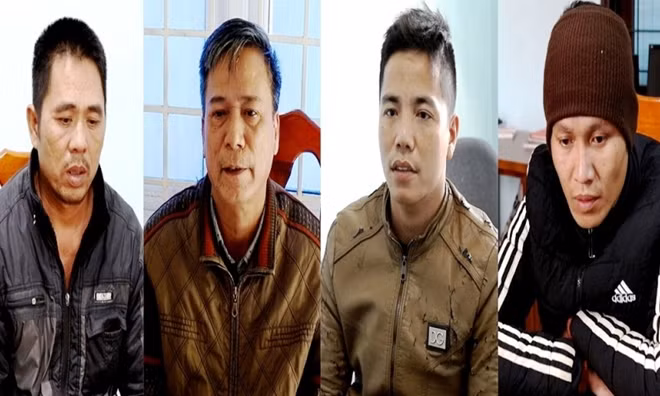 Các đối tượng trong vụ phá rừng đang bị Công an Quảng Bình tạm giữ.
