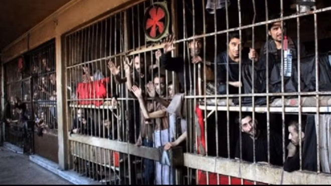 Hàng ngàn người đang bị giam giữ vô cớ trong các nhà tù của Syria. ảnh: AP.