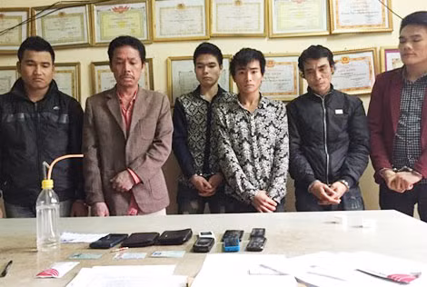 Các đối tượng và tang vật thu giữ.