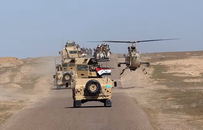 Quân đội Iraq điều vũ khí hạng nặng đến Mosul (Ảnh: Iraq News)