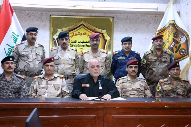 Thủ tướng Iraq Al Abadi tuyên bố chiến dịch tấn công IS (Ảnh: Reuters)