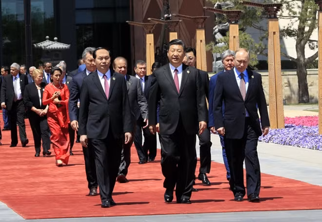 Chủ tịch nước Trần Đại Quang và các Trưởng đoàn tại Diễn đàn cấp cao hợp tác quốc tế “Vành đai và Con đường”. Ảnh: Nhan Sáng.