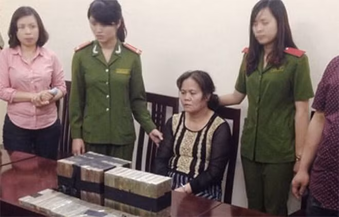 Đối tượng Trịnh Thị Hải Hà và tang vật.
