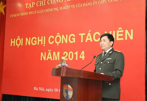 Tổng Biên tập Tạp chí CAND Trần Vi Dân phát biểu tại hội nghị.
