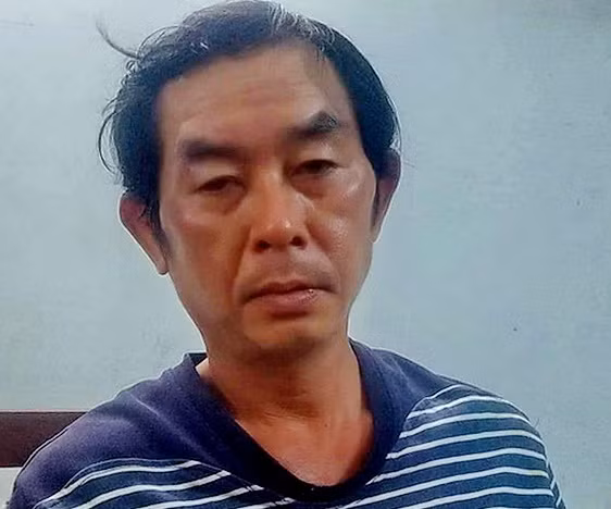 Hung thủ Ngô Xuân Hùng sau khi bị bắt giữ