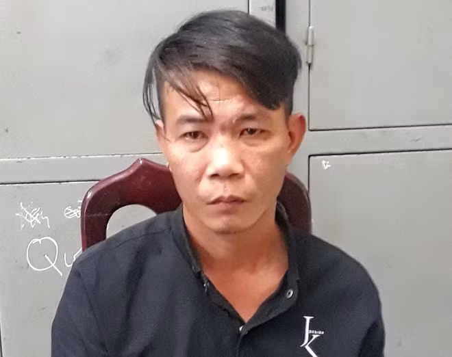 Hung thủ Bùi Quang Hoàng sau khi bị tạm giữ hình sự.