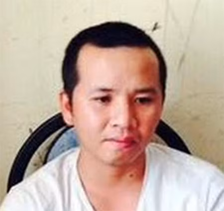Nguyễn Tiến Thiện sau khi bị bắt giữ. Ảnh : CA TP.HCM