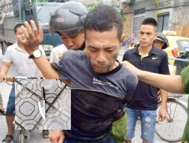 Hung thủ Nguyễn Văn Tuấn bị quần chúng bắt giữ ngay tại hiện trường gây án.