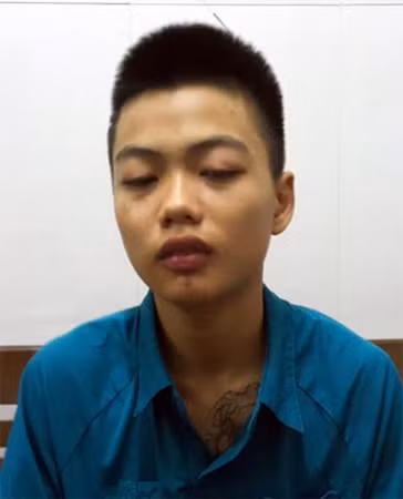 Đối tượng Đức tại cơ quan điều tra (ảnh: Anh Thư) Đối tượng Đức tại cơ quan điều tra (ảnh: Anh Thư)