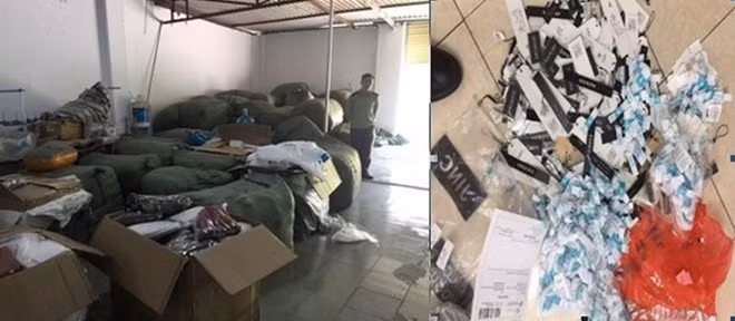 Lực lượng chức năng tạm giữ số quần áo và tem nhãn bị gỡ.