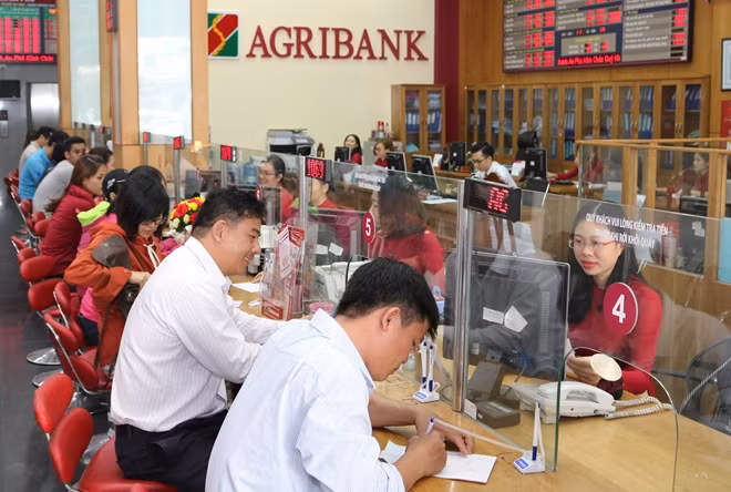 Việc giảm lãi suất cho vay sẽ tạo điều kiện cho doanh nghiệp và người dân phát triển sản xuất và đời sống.