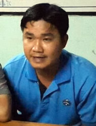 Đối tượng Lý Hoàng Minh, bị bắt quả tang nhận hối lộ của các doanh nghiệp vận tải.