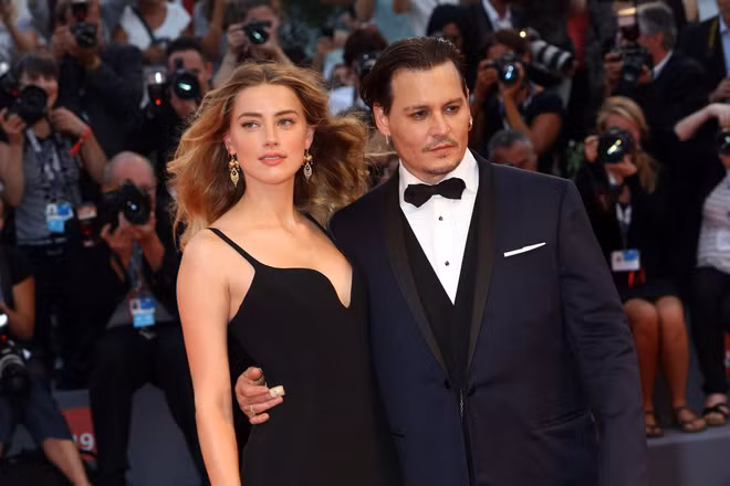 Depp và vợ trước khi ly hôn.