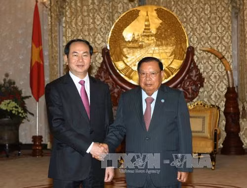 Chủ tịch nước Trần Đại Quang và Tổng Bí thư, Chủ tịch nước Lào Bounnhang Vorachit. Ảnh: TTXVN.