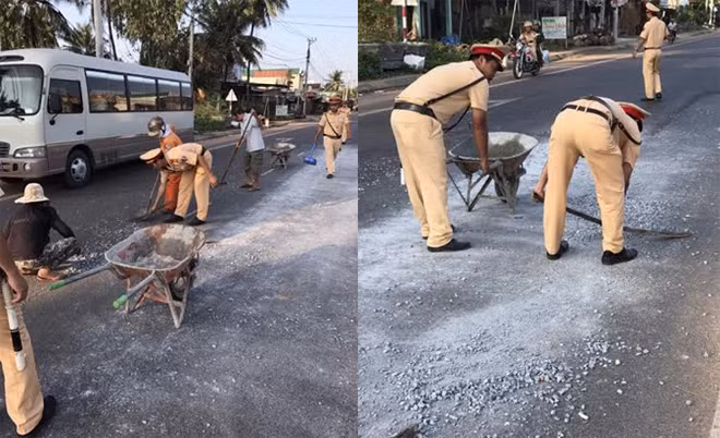 Lực lượng CSGT cùng người dân quét dọn đá rơi vãi trên đường.