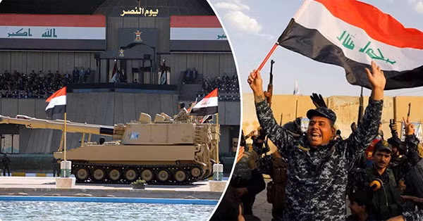 Quân đội Iraq diễu hành ăn mừng chiến thắng trước IS. Ảnh: Reuters.