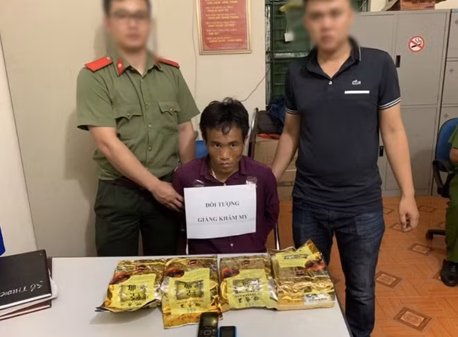 Giàng Khăm My và tang vật.