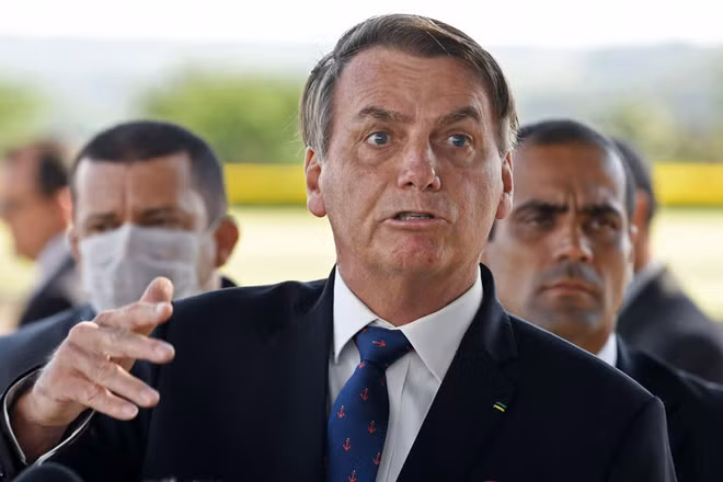 Tổng thống Brazil Jair Bolsonaro trả lời báo chí hôm 21/3.