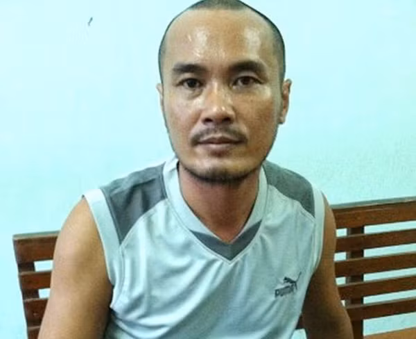 Hung thủ Nguyễn Trọng Toàn sau khi bị bắt. Ảnh : Trị Bình.