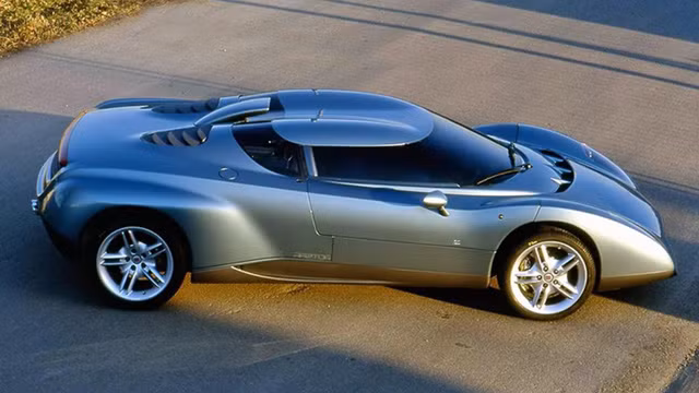 7. Zagato Raptor: Sử dụng nền tảng của hệ thống dẫn động bốn bánh của Diablo, Raptor là nguyên mẫu được thiết kế vào năm 1996 cùng với sự hợp tác của Zagato. Mui xe được thiết kế theo dạng mái đôi.Điểm đặc biệt nhất của Zagato Raptor là không có cửa xe. Người lái muốn vào xe sẽ phải bấm nút vào toàn bộ phần thân giữa sẽ mở ra để chủ nhân bước vào trong. 7. Zagato Raptor: Sử dụng nền tảng của hệ thống dẫn động bốn bánh của Diablo, Raptor là nguyên mẫu được thiết kế vào năm 1996 cùng với sự hợp tác của Zagato. Mui xe được thiết kế theo dạng mái đôi.Điểm đặc biệt nhất của Zagato Raptor là không có cửa xe. Người lái muốn vào xe sẽ phải bấm nút vào toàn bộ phần thân giữa sẽ mở ra để chủ nhân bước vào trong.