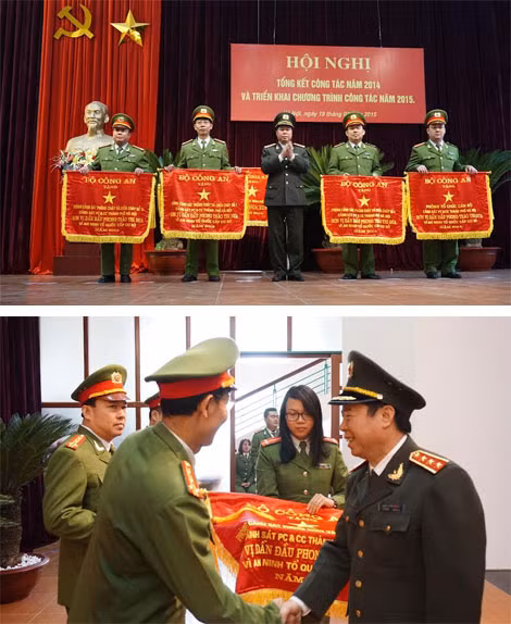 Thượng tướng Bùi Văn Nam trao cờ thi đua của Bộ Công an tặng 4 đơn vị thuộc Cảnh sát PC&CC TP Hà Nội.
